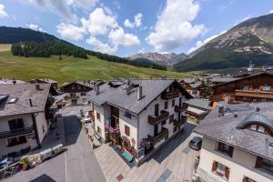an aerial view of a town in the mountains at Chalet La Nuvola in Livigno