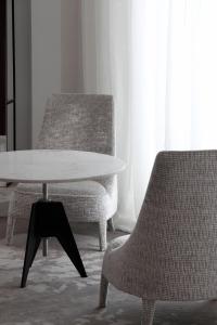 Posezení v ubytování Yndo Hôtel