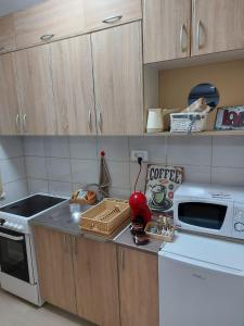 Dapur atau dapur kecil di Apartman ESPRESSO sa parkingom