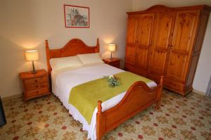 Postel nebo postele na pokoji v ubytování Casa TAPIOLAS