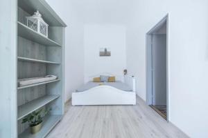 Posteľ alebo postele v izbe v ubytovaní Souper Apartments Downtown-Király Street