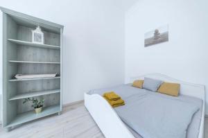 Posteľ alebo postele v izbe v ubytovaní Souper Apartments Downtown-Király Street