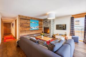 TV a/nebo společenská místnost v ubytování Chalet Petit