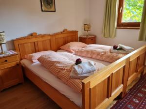 Postelja oz. postelje v sobi nastanitve Haus Oswaldi by Globalimmoservice