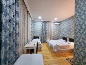 Katil atau katil-katil dalam bilik di HOTEL JULIA Akhaltsikhe