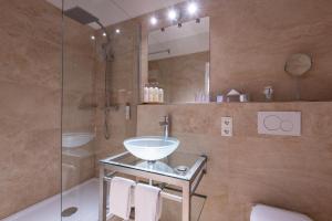Een badkamer bij Hotel Seevilla Wolfgangsee