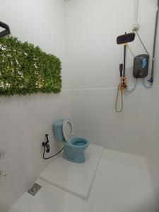 ห้องน้ำของ Basrie Villa Pagoh - Mini Cinema , Private Pool , Wi-Fi , NetFlix