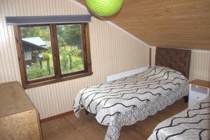 Postel nebo postele na pokoji v ubytování El Refugio de la Cuenca