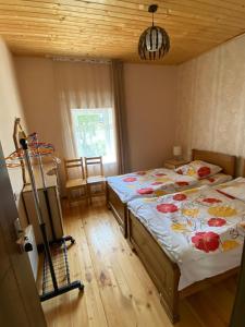 Rúm í herbergi á Mestiatour Guest House