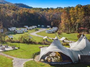 an aerial view of a camping site with tents at Under Canvas Great Smoky Mountains in Pigeon Forge