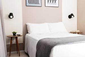 Кровать или кровати в номере Ilhasul Hotel Residencia