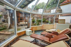 Posezení v ubytování Flair Hotel Zum Schwarzen Reiter