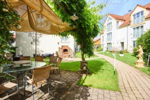 Zahrada ubytování Flair Hotel Zum Schwarzen Reiter