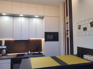 Kuchyň nebo kuchyňský kout v ubytování Kaposvár Apartman
