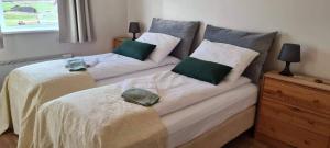 Katil atau katil-katil dalam bilik di Guesthouse Stekkatún