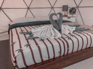 Ένα ή περισσότερα κρεβάτια σε δωμάτιο στο Igloo Glamping Bali