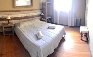 Postel nebo postele na pokoji v ubytování Bariloche Hostel