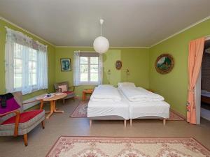 Postel nebo postele na pokoji v ubytování Holiday Home Nedre II
