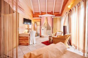 Postel nebo postele na pokoji v ubytování Flair Hotel Zum Schwarzen Reiter