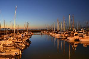 a group of boats docked in a marina at The Anchor, Luxury living for 2 with sea view and Jacuzzi in Gordonʼs Bay