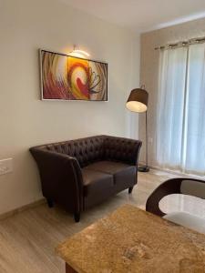 Posezení v ubytování Avi Fortune Suites - Near Bangalore International Airport