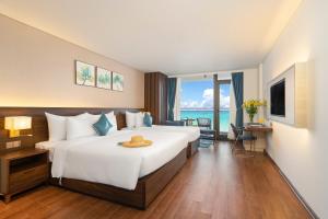 Canvas Danang Beach Hotel客房内的一张或多张床位