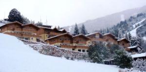 Genieten in Saalbach, Alpenresort Saalbach Top D1 by Droomvilla om vinteren