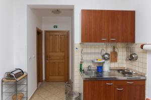 a kitchen with a sink and a counter top at K-apartments in Dubrovnik
