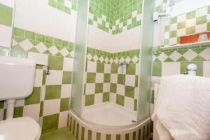 Koupelna v ubytování Hotel Porat