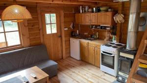 Kuchyň nebo kuchyňský kout v ubytování Nature Getaway Holiday Home