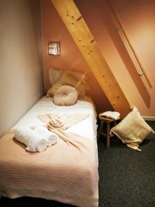 En eller flere senge i et værelse på Villers la villA