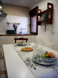 A kitchen or kitchenette at La Casa de los Abuelos Valentín