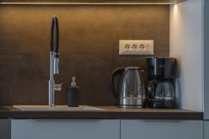 Kaffe- og tefaciliteter på Apartmani Ana 2 i 3