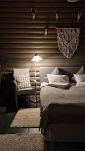 Tempat tidur dalam kamar di Villa Marienholm