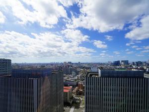 a view of a city from the top of a building at LOISIR HOTEL SHINAGAWA SEASIDE in Tokyo