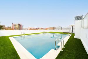 The swimming pool at or close to Francisco Remiro Fabulous Furnished Apartments in Guindalera
