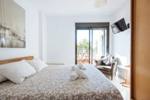 Posteľ alebo postele v izbe v ubytovaní Apartamento Mairena + 20 fotografií