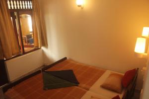 Voodi või voodid majutusasutuse New Imperial Hotel toas