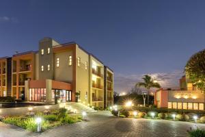 a rendering of a building at night at St Andrews Hotel and Spa in Johannesburg