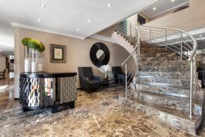 Φωτογραφία από το άλμπουμ του St Andrews Hotel and Spa στο Γιοχάνεσμπουργκ