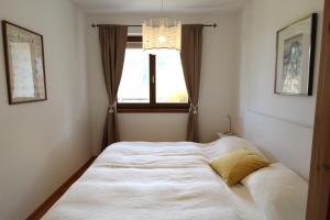 Łóżko lub łóżka w pokoju w obiekcie DOLCEVITA - Family Aparment 300 m from ski slope