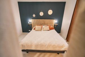 Postel nebo postele na pokoji v ubytování Chez Nico et Anne