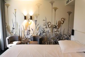 Postel nebo postele na pokoji v ubytování Hotel Iris