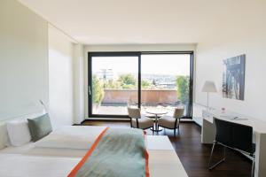 Llit o llits en una habitació de THE FLAG Zürich