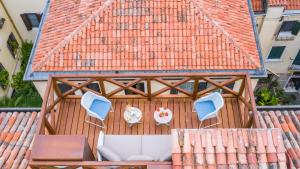 A balcony or terrace at Ca' Dell'Opera Terrace - Dimora Italia -