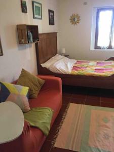 Łóżko lub łóżka w pokoju w obiekcie Alba del Magredo