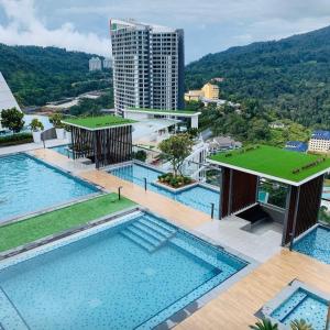 an overhead view of two swimming pools in a city at Genting Windmill Amazing Sky Pool 2bedroom With Aircon Wi-Fi in Genting Highlands