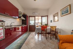 Kuchyň nebo kuchyňský kout v ubytování Appartamento Azalea