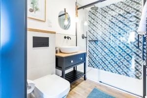 a bathroom with a sink and a shower at Apartamenty na Leśnej in Bukowina Tatrzańska +286 photos