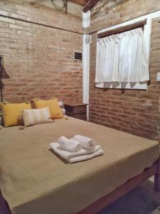 Ein Bett oder Betten in einem Zimmer der Unterkunft Cabañas Aires de Montaña